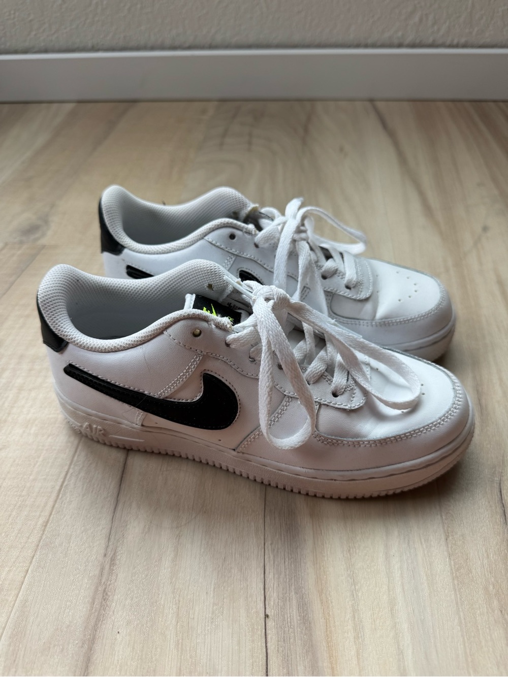 Nike White Kids Air Force 1 Sneakers with Black Swoosh Velcro logos